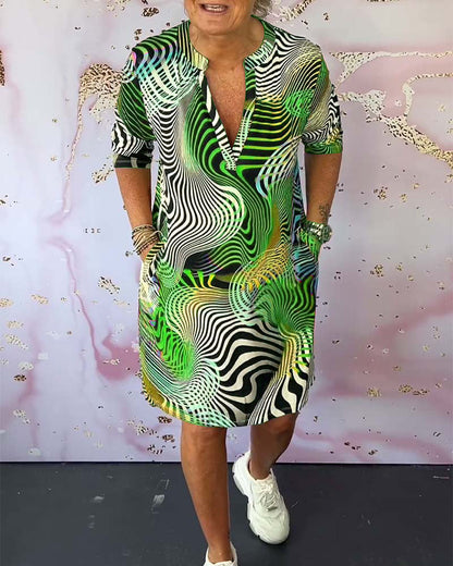 Ria™ | Buntes Kleid mit V-Ausschnitt